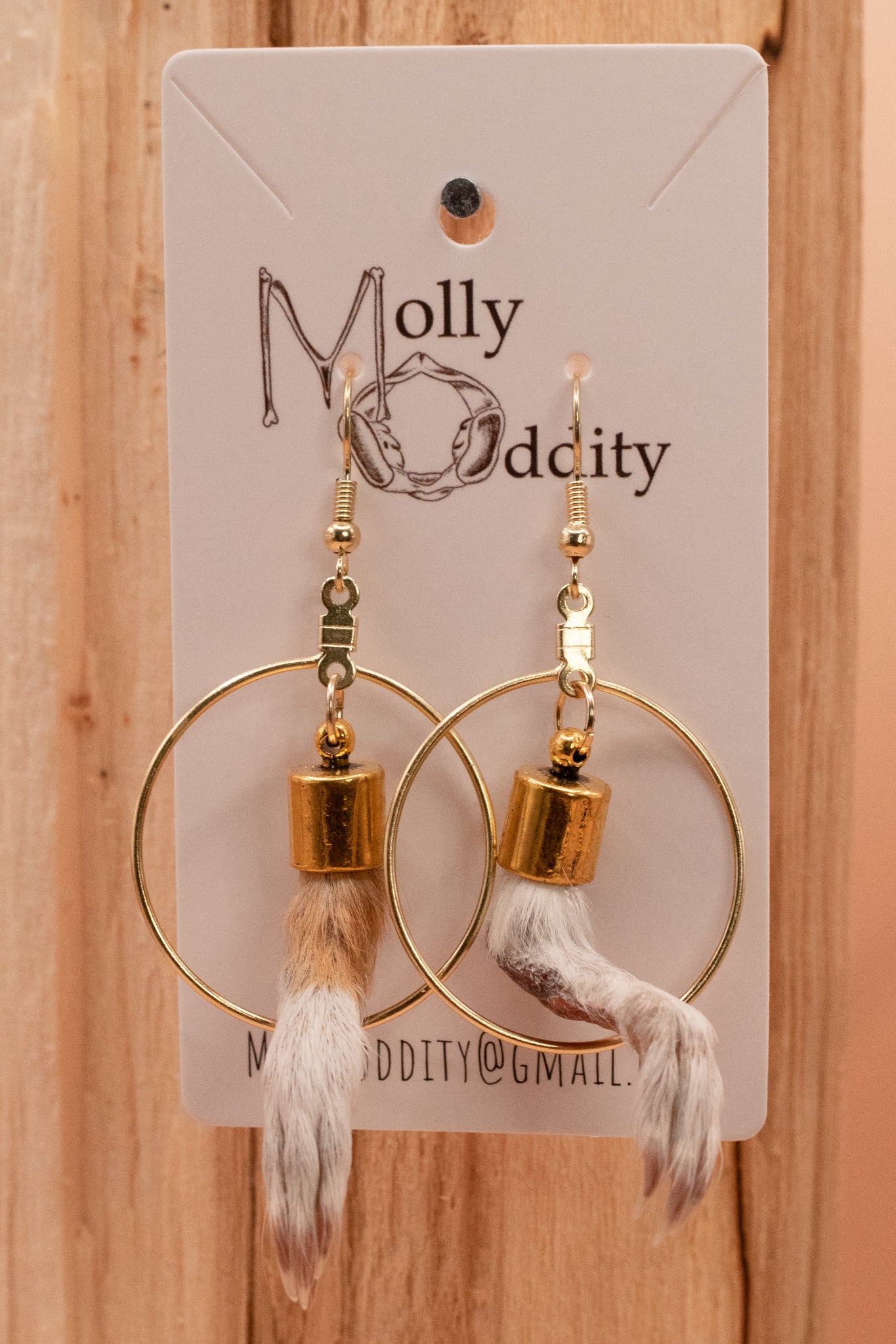 Mummified Paws in Hoop Earrings